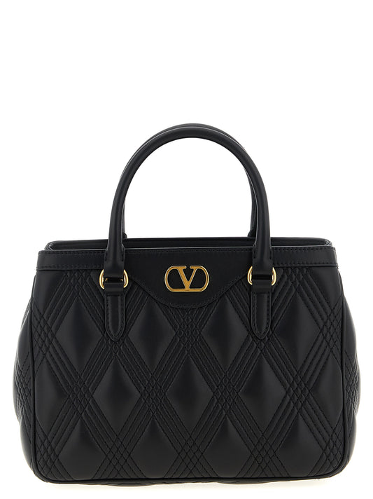 Quilted Handbag by Valentino Garavani for women in lamb leather black & signature features a exquisite silhouette, showcasing a secure and exquisite with versatile shoulder-strap, adjustable-strap & handle for a exquisite finish.