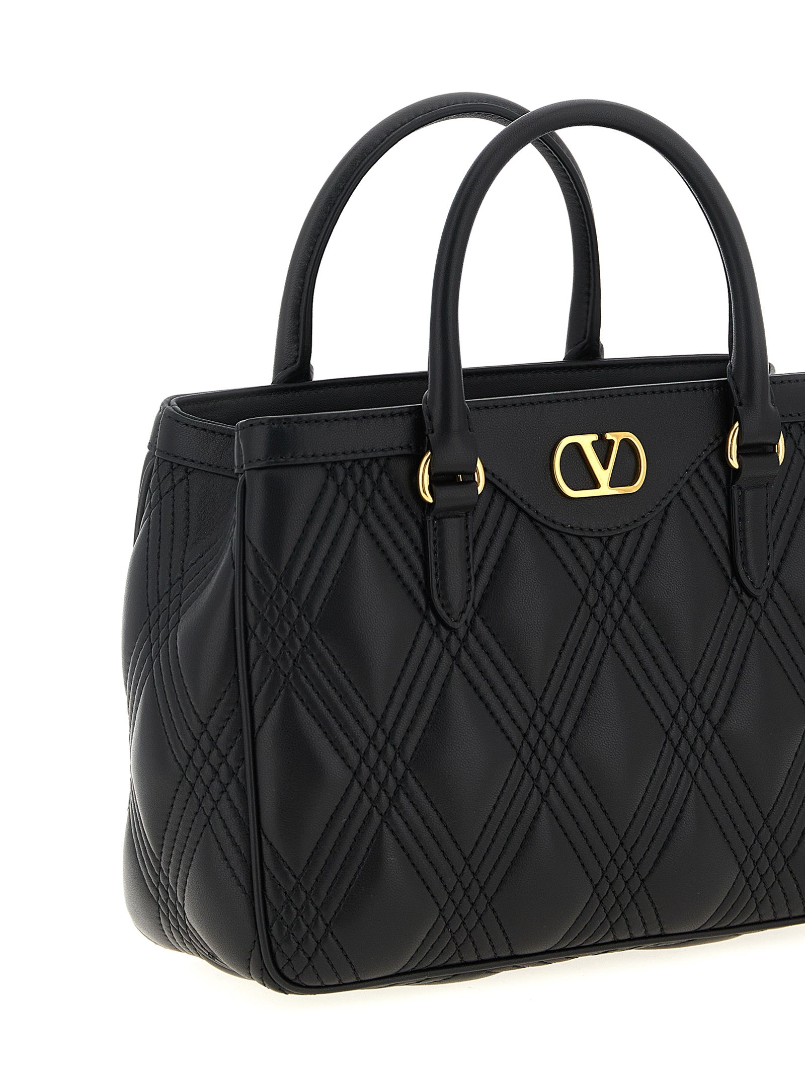 Quilted Handbag by Valentino Garavani for women in lamb leather black & signature features a signature silhouette, showcasing a secure and signature with versatile shoulder-strap, adjustable-strap & handle for a sophisticated look.