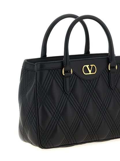 Quilted Handbag by Valentino Garavani for women in lamb leather black & signature features a signature silhouette, showcasing a secure and signature with versatile shoulder-strap, adjustable-strap & handle for a sophisticated look.