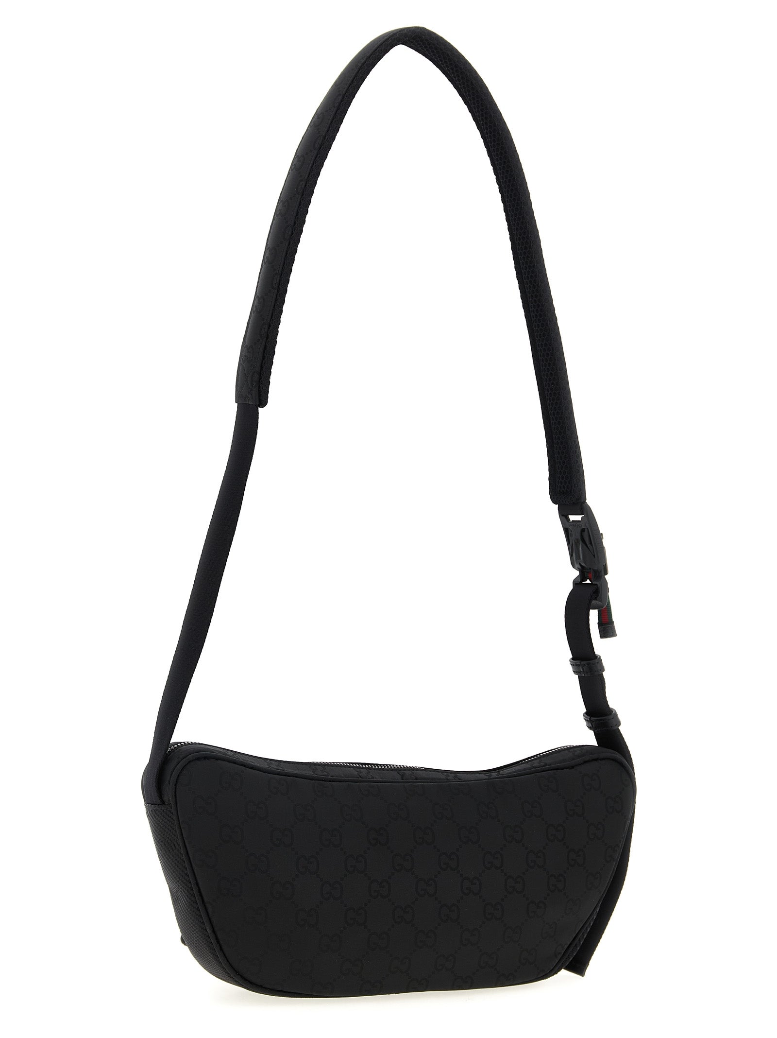 This Large Crossbody Messenger Bag by Gucci for men in nylon polyester & polyethylene black presents a versatile silhouette from the Gg Nexus Nylon Polyester & Polyethylene Large Crossbody Messenger Bag collection, featuring a secure zipper, ample external-pockets, and versatile crossbody-strap, shoulder-strap & adjustable-strap.