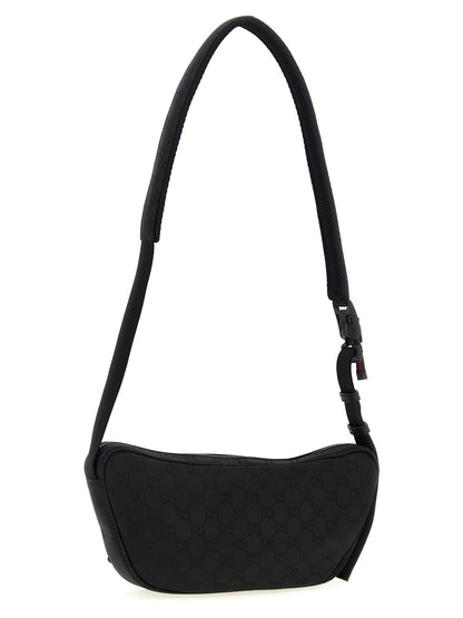 This Large Crossbody Messenger Bag by Gucci for men in nylon polyester & polyethylene black presents a versatile silhouette from the Gg Nexus Nylon Polyester & Polyethylene Large Crossbody Messenger Bag collection, featuring a secure zipper, ample external-pockets, and versatile crossbody-strap, shoulder-strap & adjustable-strap.