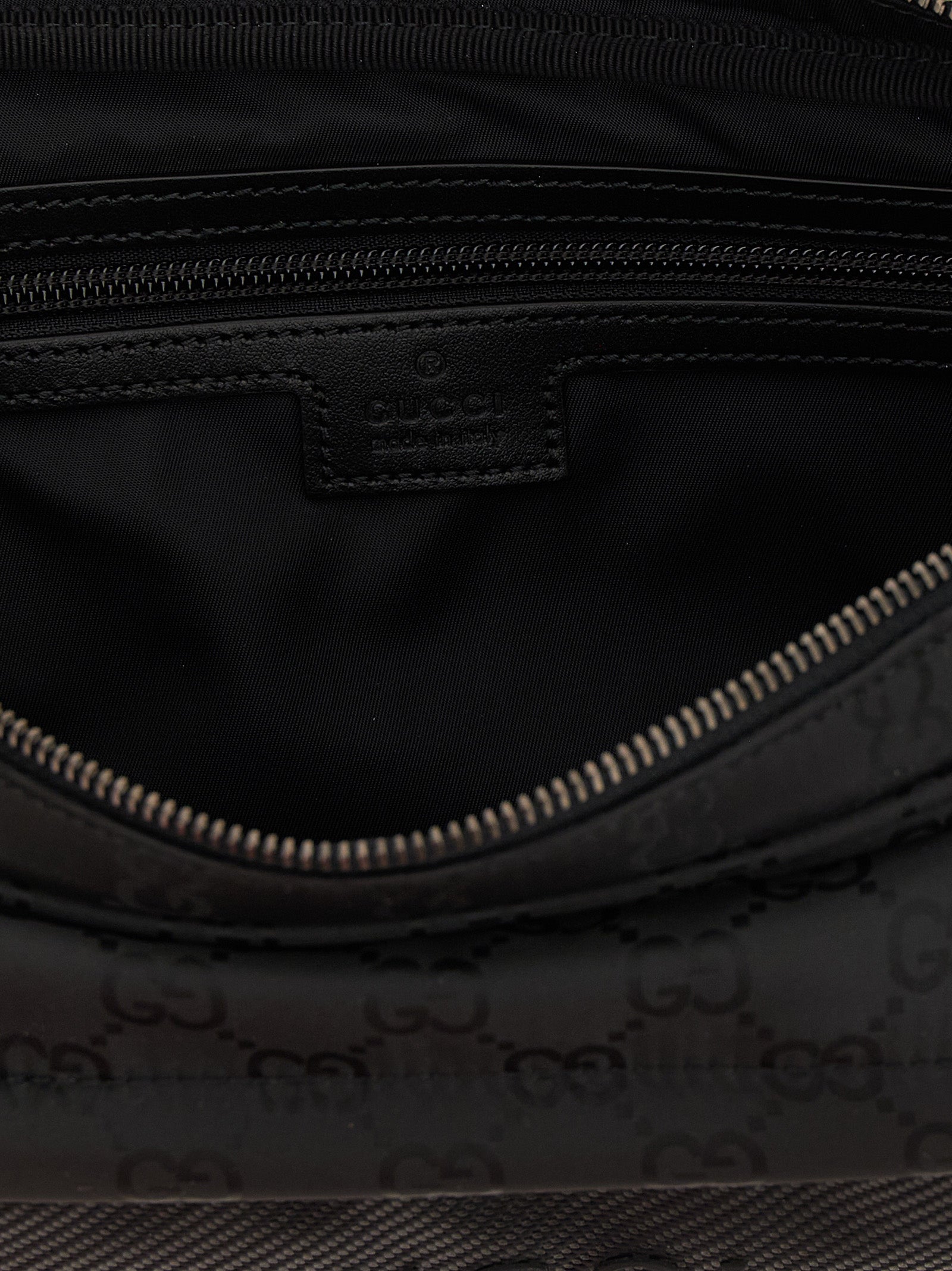 Large Crossbody Messenger Bag by Gucci for men in nylon polyester & polyethylene black features an versatile Gg Nexus Nylon Polyester & Polyethylene Large Crossbody Messenger Bag design with a versatile zipper, ample external-pockets, and versatile crossbody-strap, shoulder-strap & adjustable-strap for a sophisticated finish.