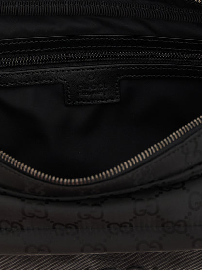 Large Crossbody Messenger Bag by Gucci for men in nylon polyester & polyethylene black features an versatile Gg Nexus Nylon Polyester & Polyethylene Large Crossbody Messenger Bag design with a versatile zipper, ample external-pockets, and versatile crossbody-strap, shoulder-strap & adjustable-strap for a sophisticated finish.
