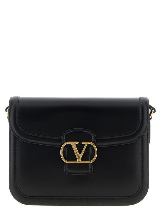 Shoulder Flap Bag by Valentino Garavani for unisex in calfskin leather black & signature features an effortlessly chic silhouette with a secure flap & magnetic, ample , and versatile shoulder-strap & adjustable-strap for effortlessly chic everyday luxury.
