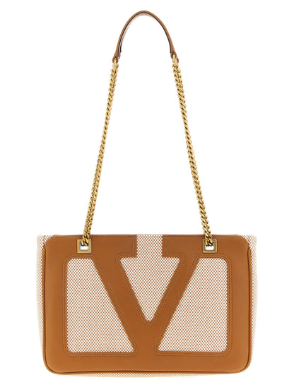 Small Shoulder Bag by Valentino Garavani for men in cotton polyester canvas brown & signature features a effortless sophistication silhouette, secured by a zipper with ample and versatile shoulder-strap & handle for a effortless sophistication finish.