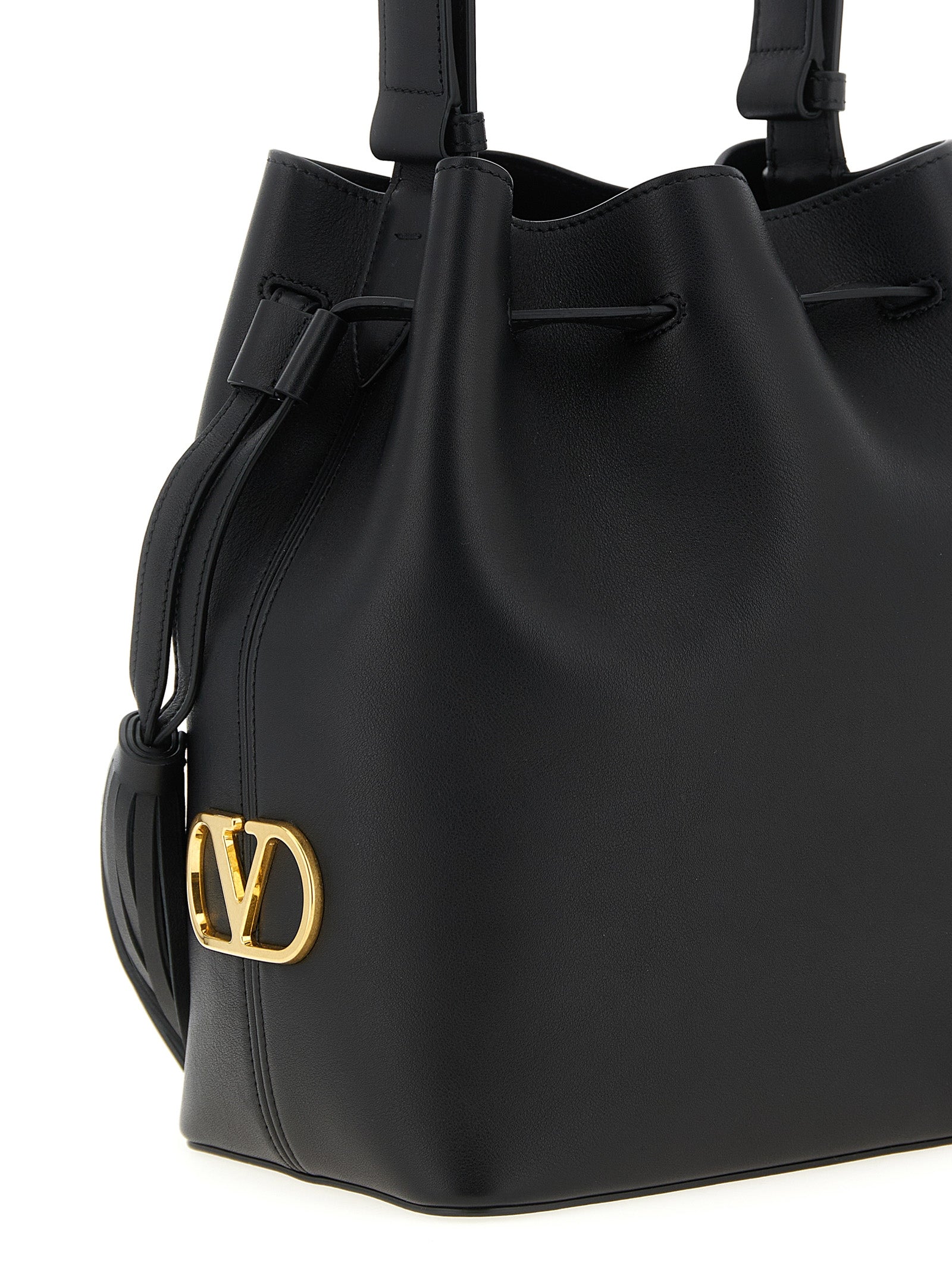 Shoulder Drawstring Bag by Valentino Garavani for women in calfskin leather black & signature features a statuesque silhouette, showcasing a secure drawstring and statuesque with versatile shoulder-strap, adjustable-strap & handle for a statuesque finish.