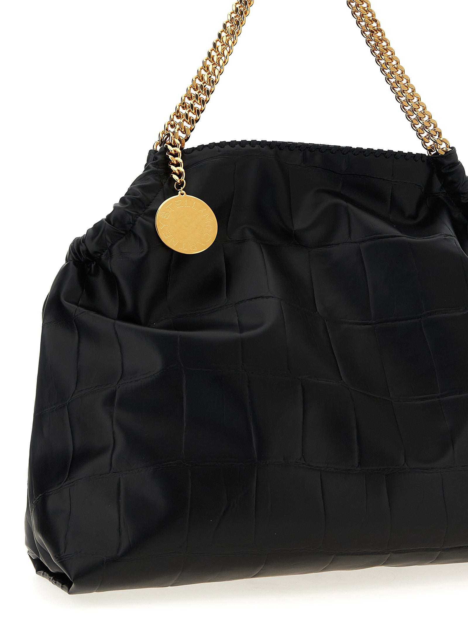 Shopper Tote Bag by Stella McCartney for women in calf leather & aluminium black & monogram showcases a statuesque Falabella The Monogram Calf Leather & Aluminium Shopper Tote Bag design, featuring a secure magnetic, ample , and versatile handle for a statuesque finish.