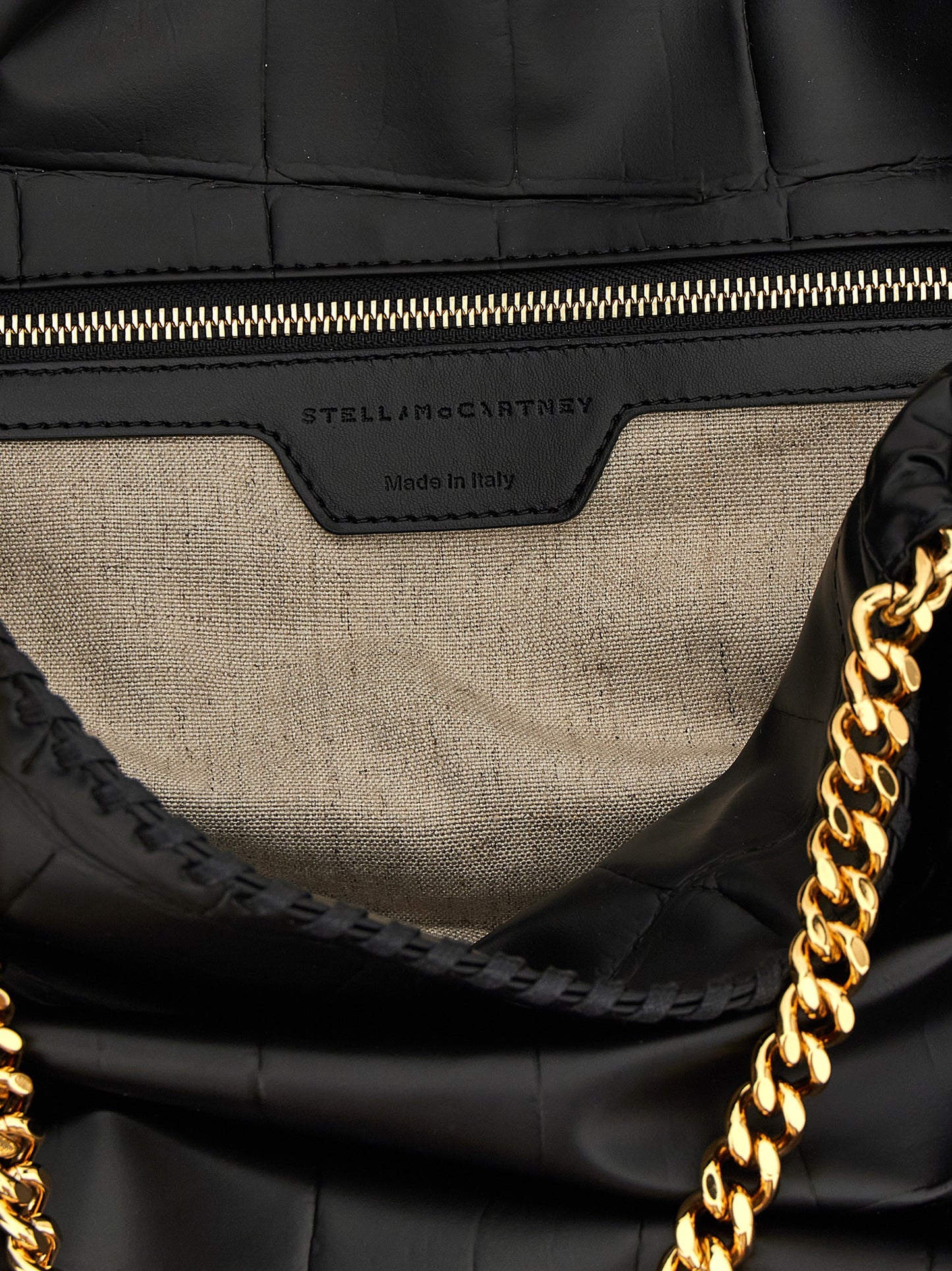 Shopper Tote Bag by Stella McCartney for women in calf leather & aluminium black & monogram features a jet-set Falabella The Monogram Calf Leather & Aluminium Shopper Tote Bag design, complete with a secure magnetic, ample , and versatile handle for a jet-set look.