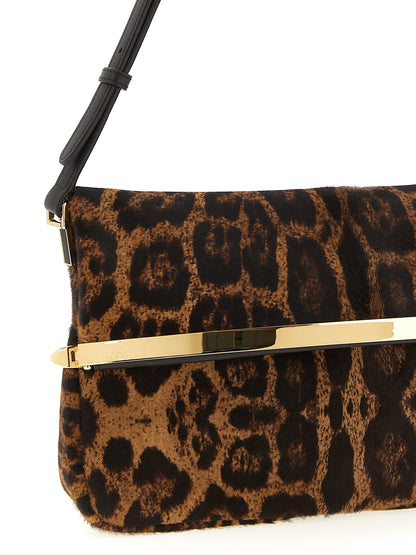 Shoulder Flap Bag by Tod's for women in calfskin leather animal, brown, magenta & print features a statuesque silhouette, showcasing a secure snap, flap & zipper and statuesque with versatile shoulder-strap, adjustable-strap & handle for a statuesque finish.