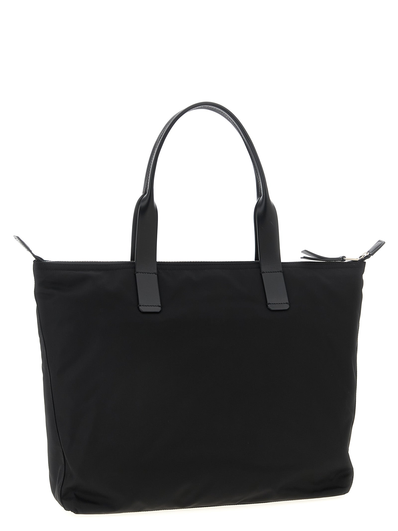 Medium Shopper Tote Bag by Dolce & Gabbana for men in leather & nylon black features an jet-set-ready silhouette, showcasing the Leather Nylon Medium Shopper Tote Bag design with a secure zipper, ample , and versatile handle.