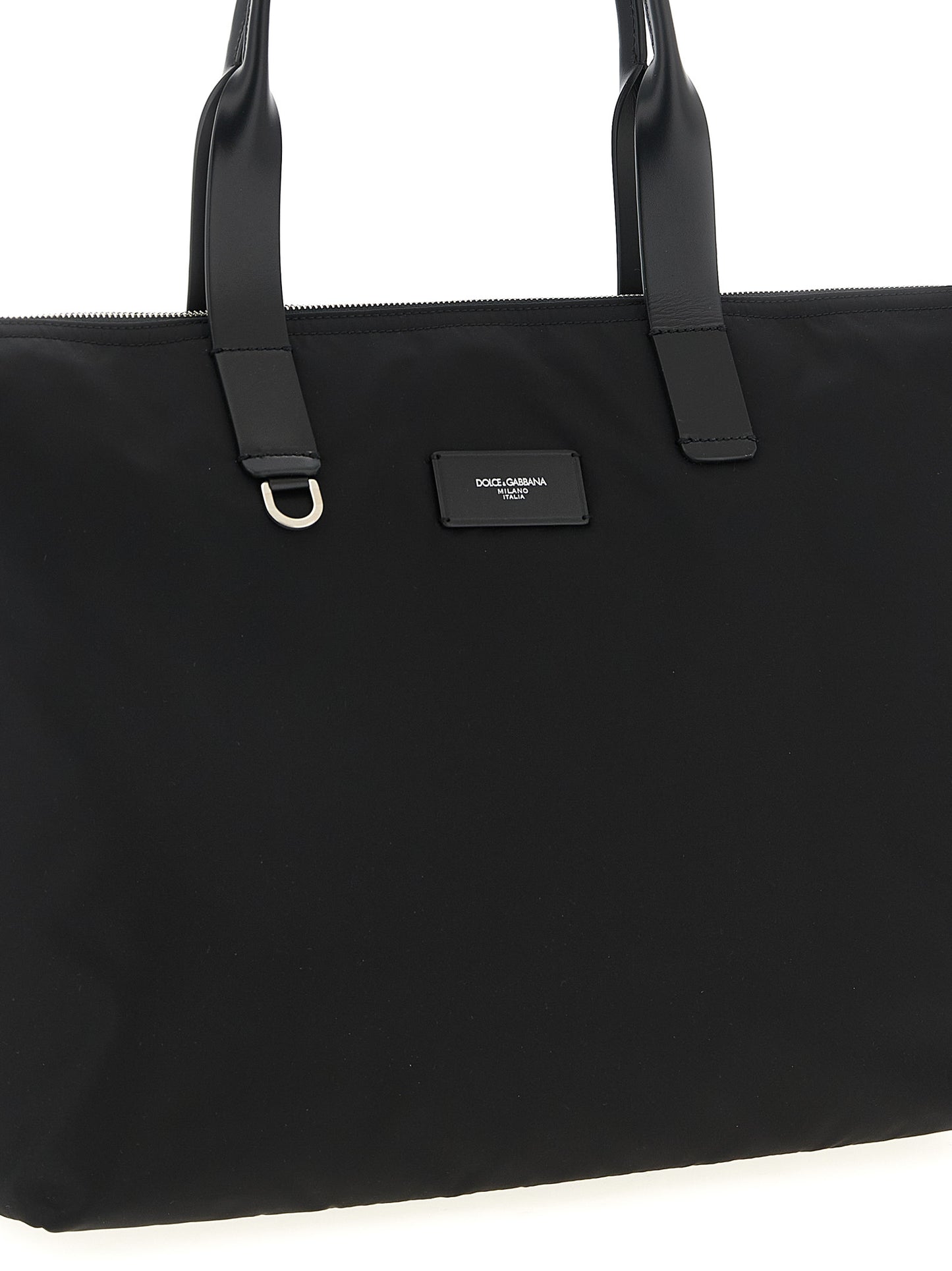 Medium Shopper Tote Bag by Dolce & Gabbana for men in leather & nylon black features a jet-set Leather Nylon Medium Shopper Tote Bag design, complete with a secure zipper, ample , and versatile handle for a jet-set look.