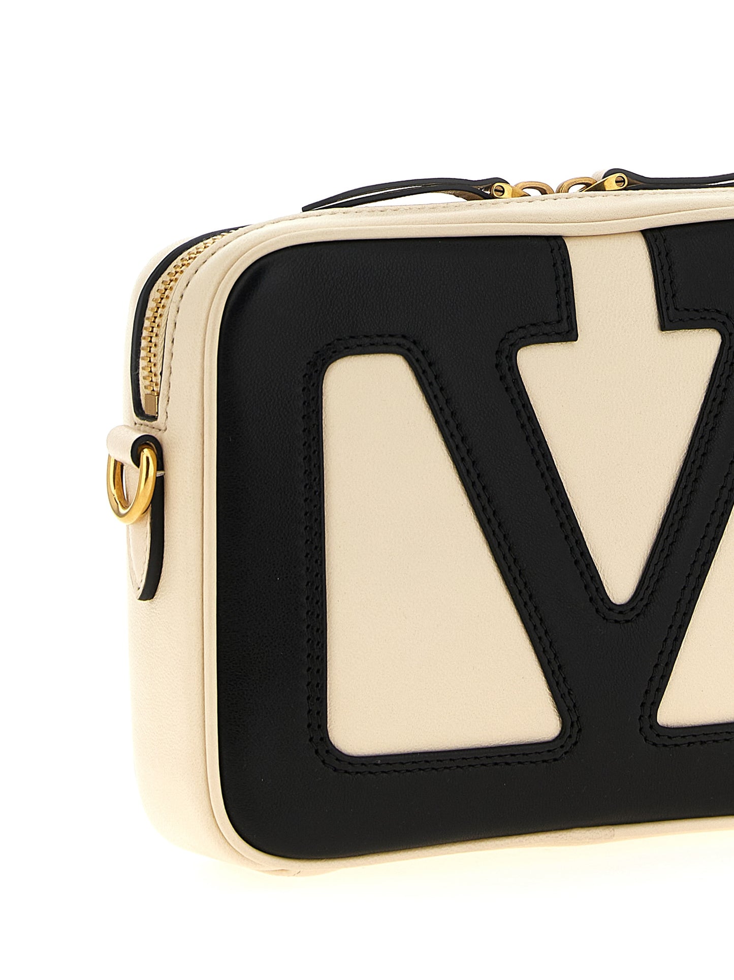 Crossbody Messenger Handbag by Valentino Garavani for unisex in polyester bicolour, black, white & signature features a transformative elegance silhouette, showcasing a secure zipper, organized , and versatile crossbody-strap, shoulder-strap & adjustable-strap for a transformative elegance look.