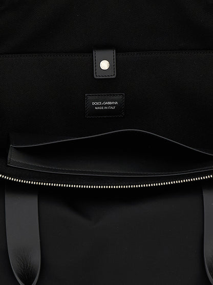 Medium Shopper Tote Bag by Dolce & Gabbana for men in leather & nylon black features an jet-set-ready silhouette, showcasing the Leather Nylon Medium Shopper Tote Bag design with a secure zipper, ample , and versatile handle.