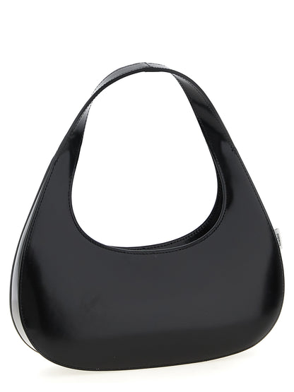 This Handbag by Coperni for women in leather and black presents a sculptural silhouette featuring a secure zipper, ample , and versatile handle for a sculptural finish.