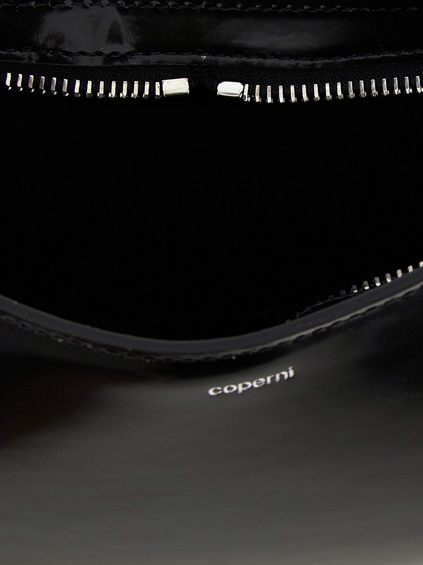 Handbag by Coperni for women in leather black features a exquisite silhouette, showcasing a secure zipper and exquisite with versatile handle for a exquisite finish.
