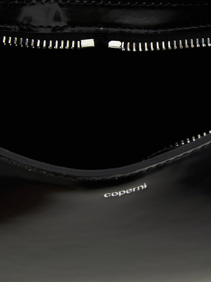Handbag by Coperni for women in leather black features a exquisite silhouette, showcasing a secure zipper and exquisite with versatile handle for a exquisite finish.