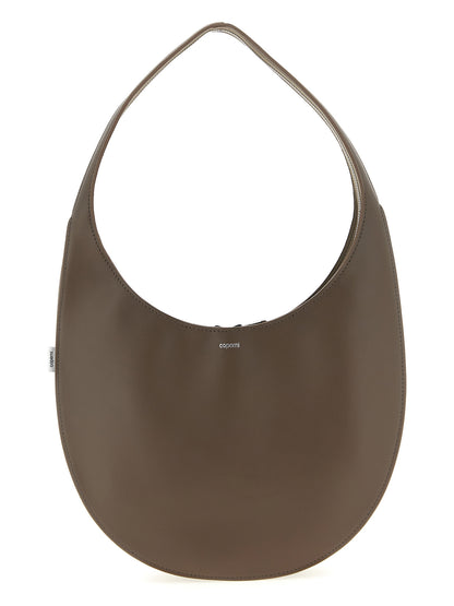 Medium Shoulder Bag by Coperni for women in bos taurus calf suede leather brown features a stately silhouette, showcasing a secure zipper, ample , and stately shoulder-strap for a stately finish.