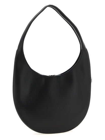 Medium Shoulder Bag by Coperni for women in bos taurus calf suede leather black presents a statuesque silhouette, showcasing a secure zipper and statuesque with versatile shoulder-strap for a sophisticated look.