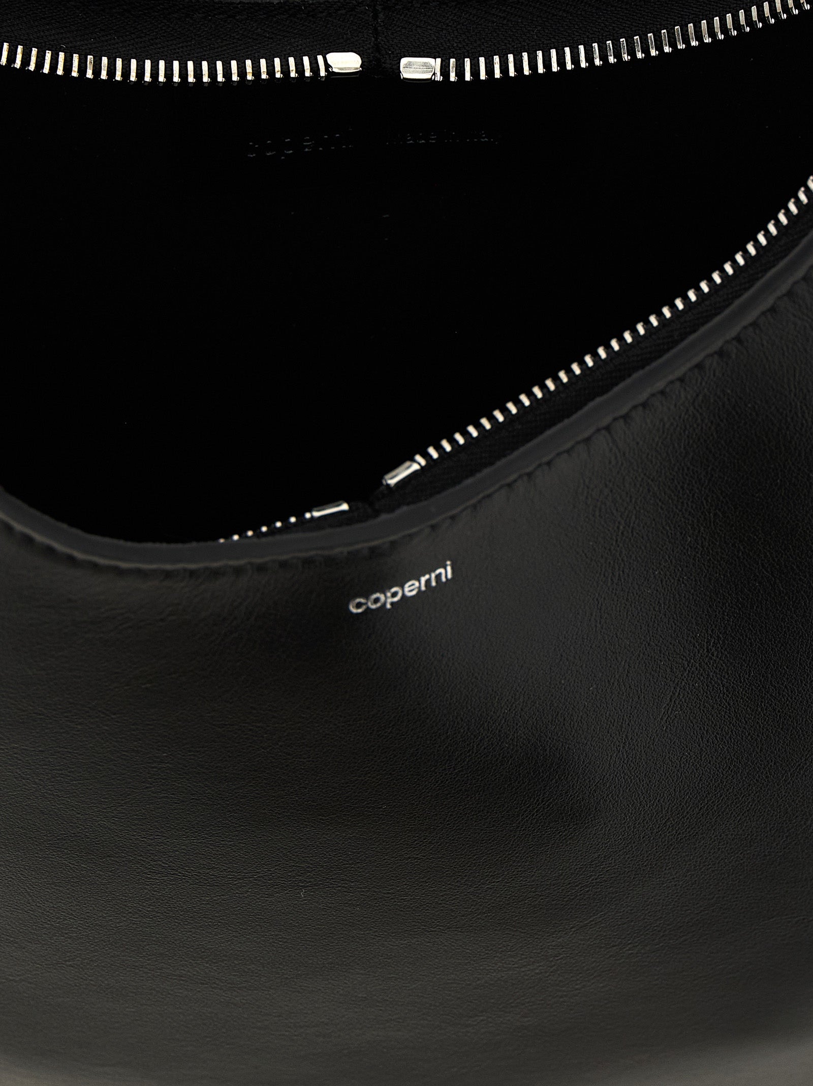 Medium Shoulder Bag by Coperni for women in bos taurus calf suede leather black features an effortlessly chic silhouette with a secure zipper, ample , and versatile shoulder-strap for effortlessly chic everyday luxury.