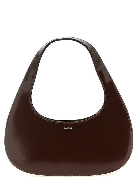 Handbag by Coperni for women in leather brown presents a ornamental silhouette, showcasing a secure zipper, ample , and versatile handle for a ornamental finish.