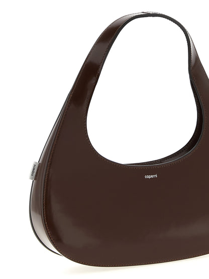 Handbag by Coperni for women in leather brown features a refined silhouette, showcasing a secure zipper, organized , and versatile handle for a refined finish.
