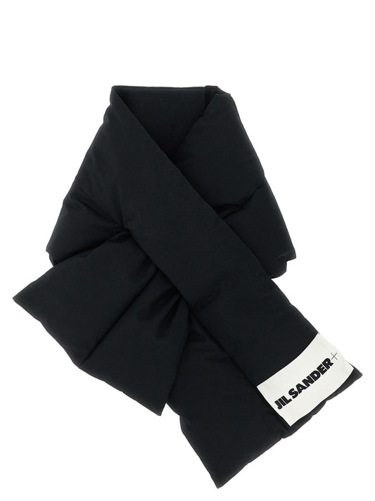 Scarf by Jil Sander for unisex in cotton & goose down black presents a effortlessly chic silhouette, artfully capturing the essence of the effortlessly chic Cotton & Goose Down Foulard Wrap Scarf design for a sophisticated look.