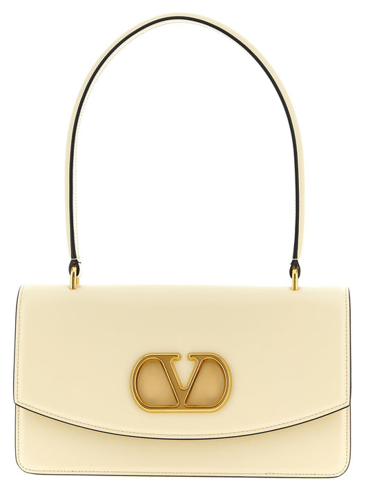 Shoulder Flap Bag by Valentino Garavani for women in calfskin leather white & signature features a stately silhouette, showcasing a secure flap & magnetic, ample , and stately shoulder-strap & handle for a stately finish.