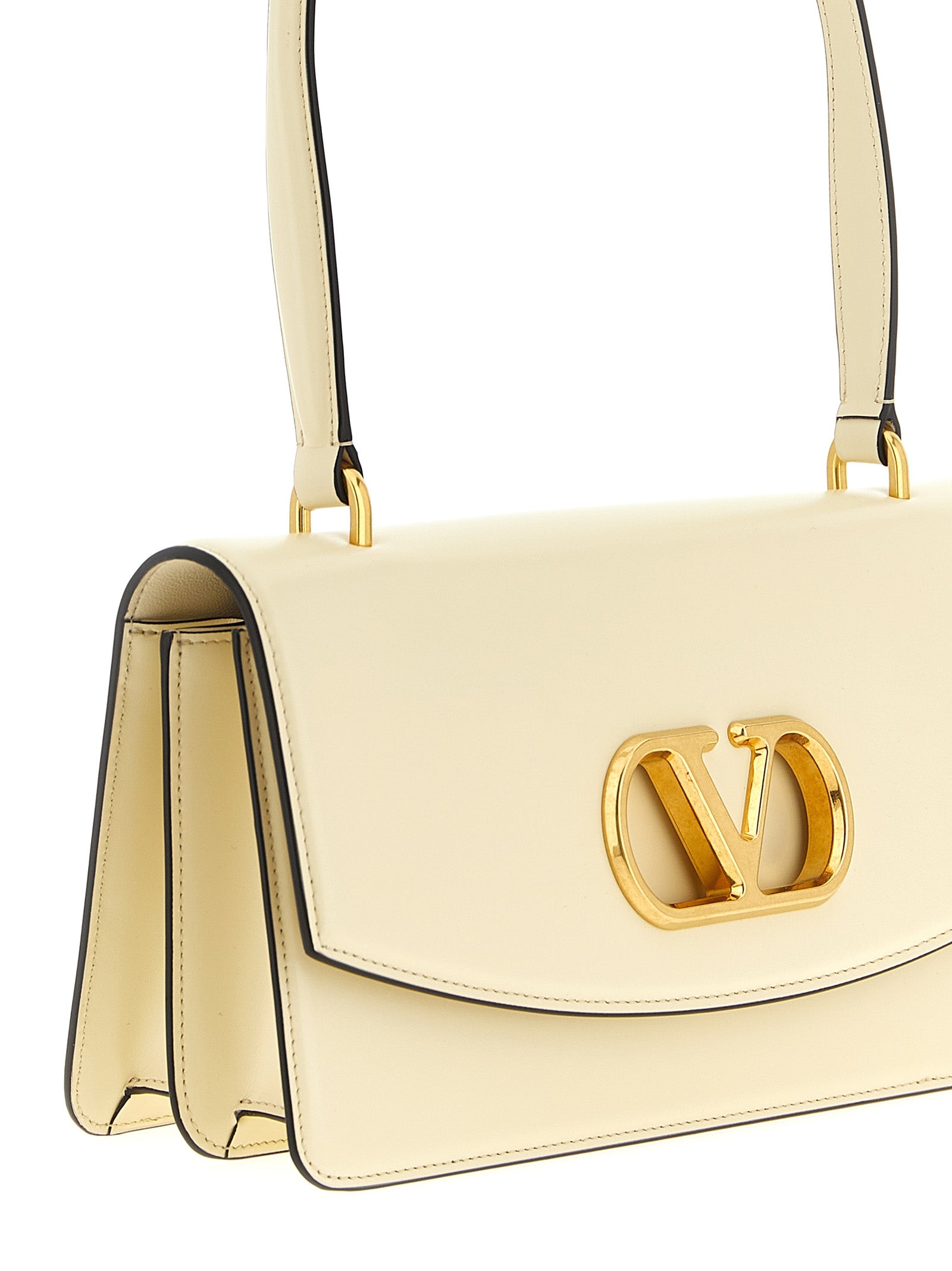 Shoulder Flap Bag by Valentino Garavani for women in calfskin leather white & signature features a effortless sophistication silhouette, secured by a flap & magnetic with ample and versatile shoulder-strap & handle for a effortless sophistication finish.