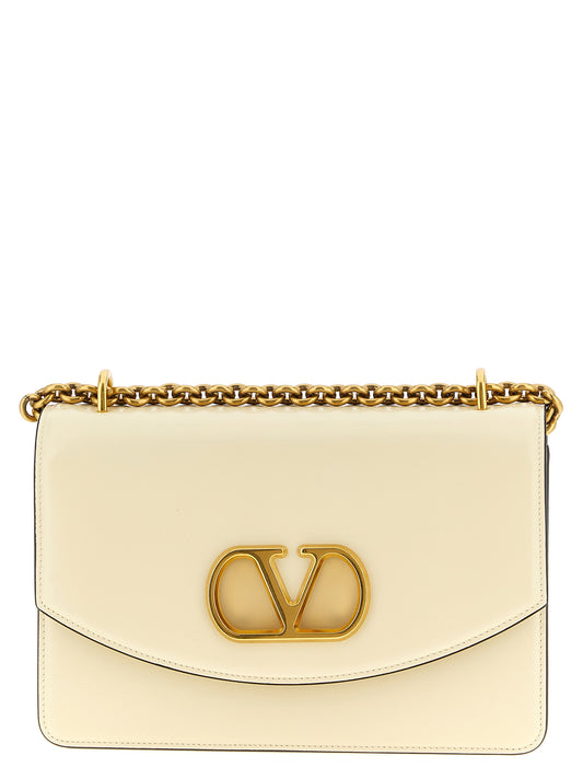 Shoulder Flap Bag by Valentino Garavani for women in calfskin leather white & signature features a effortless chic silhouette with a secure flap & magnetic, ample , and versatile shoulder-strap for a effortless chic finish.