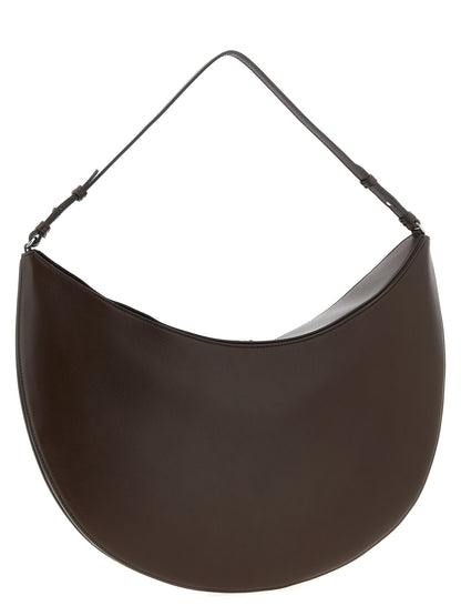 Shoulder Flap Bag by Jacquemus for women in calfskin leather brown features an effortlessly chic silhouette with a secure flap, magnetic & button, ample , and versatile shoulder-strap, adjustable-strap & handle for effortlessly chic everyday luxury.