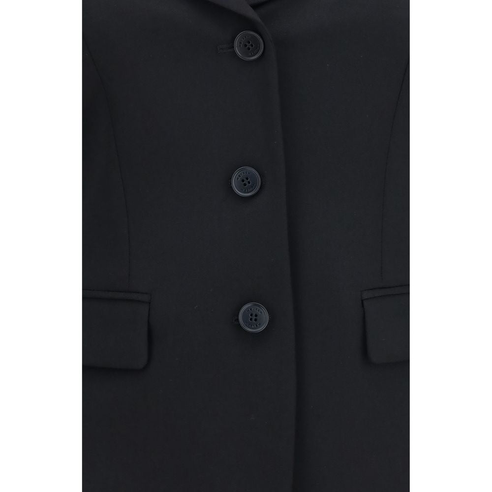 Overcoat by Alexander McQueen for women in merino wool black presents a luxurious silhouette, showcasing a luxurious and sophisticated pockets for a premium, luxurious look.