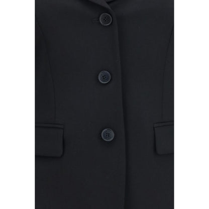 Overcoat by Alexander McQueen for women in merino wool black presents a luxurious silhouette, showcasing a luxurious and sophisticated pockets for a premium, luxurious look.