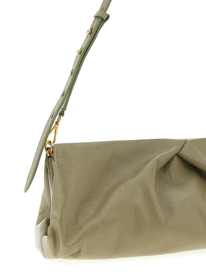 Clutch Handbag by Dries Van Noten for women in calfskin leather bicolour & green features a statuesque silhouette, showcasing a secure snap & magnetic and organized with versatile shoulder-strap & adjustable-strap for statuesque evening wear.