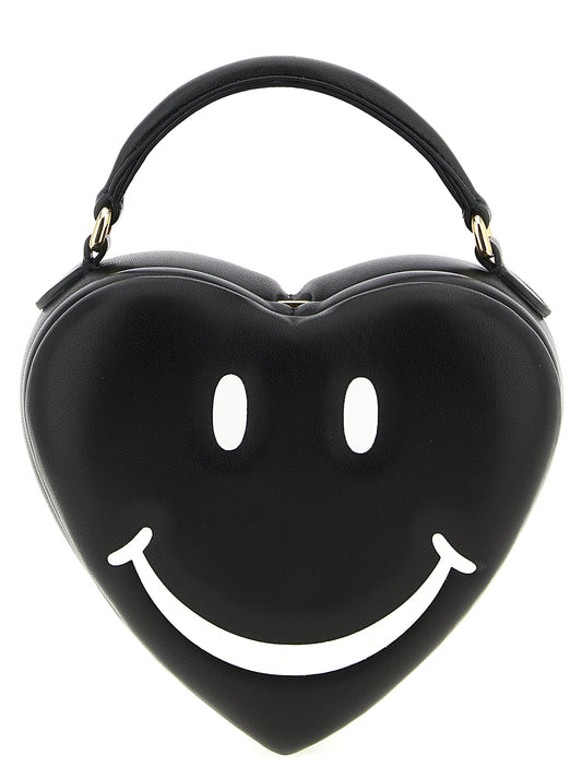 Handbag by Moschino for women in foam black features a refined silhouette, showcasing a secure , organized , and versatile shoulder-strap, adjustable-strap & handle for a refined finish.