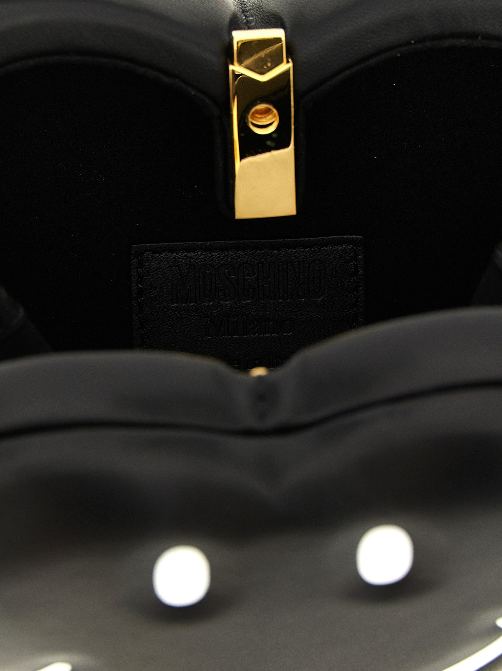 Handbag by Moschino for women in foam black features a exquisite silhouette, showcasing a secure and exquisite with versatile shoulder-strap, adjustable-strap & handle for a exquisite finish.