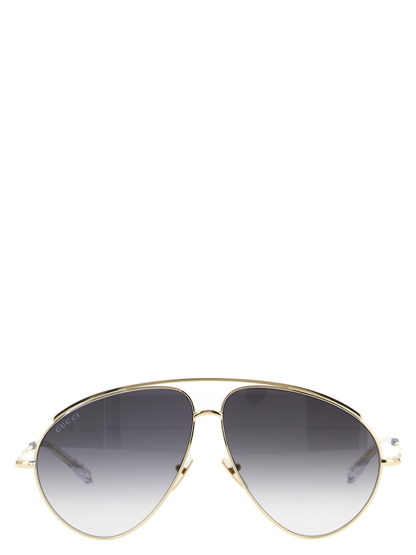 This Sunglasses by Gucci for women in acetate & polyamide gold presents a sumptuous silhouette, showcasing a sumptuous aviator frame design in gold coloured frame and high-performance .