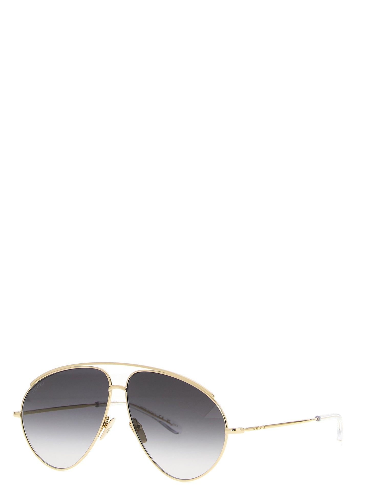 Sunglasses by Gucci for women in acetate & polyamide gold features a contemporary silhouette, showcasing a contemporary aviator frame design in gold coloured frame with high-performance .