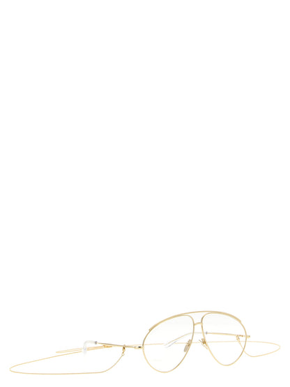 Sunglasses by Gucci for women in acetate & polyamide gold & transparent showcases a ethereal silhouette, featuring gold coloured frame aviator frame design with for a ethereal finish.