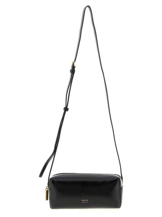Mini East West Crossbody Handbag by Khaite for women in calfskin leather black features a versatile chic silhouette, meticulously detailed with a secure zipper, ample , and versatile crossbody-strap, shoulder-strap & adjustable-strap.