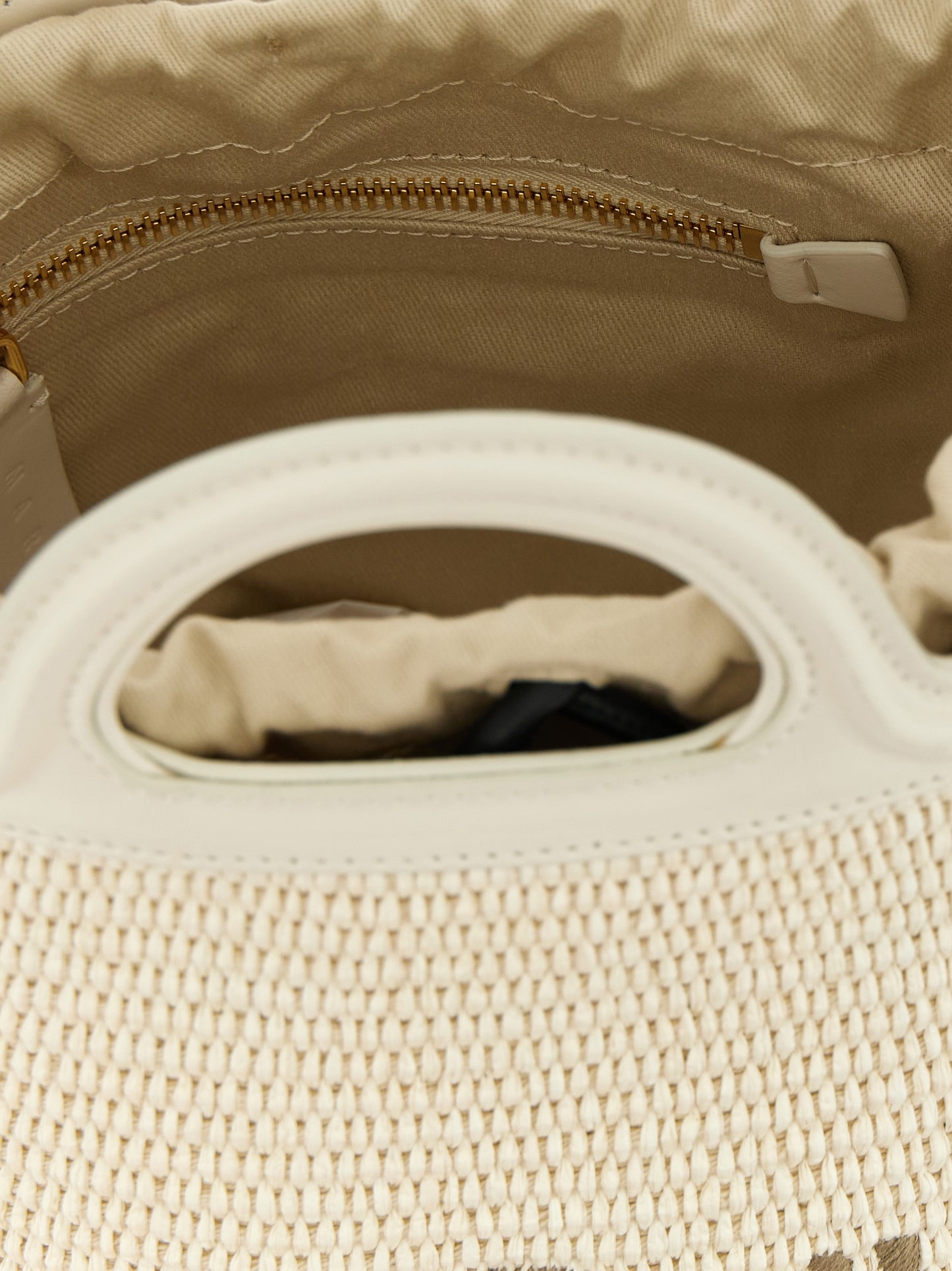 Small Bucket Handbag by Marni for women in cotton leather & polyester white features an refined silhouette, showcasing a secure drawstring, ample , and versatile shoulder-strap & adjustable-strap for a sophisticated refined aesthetic.