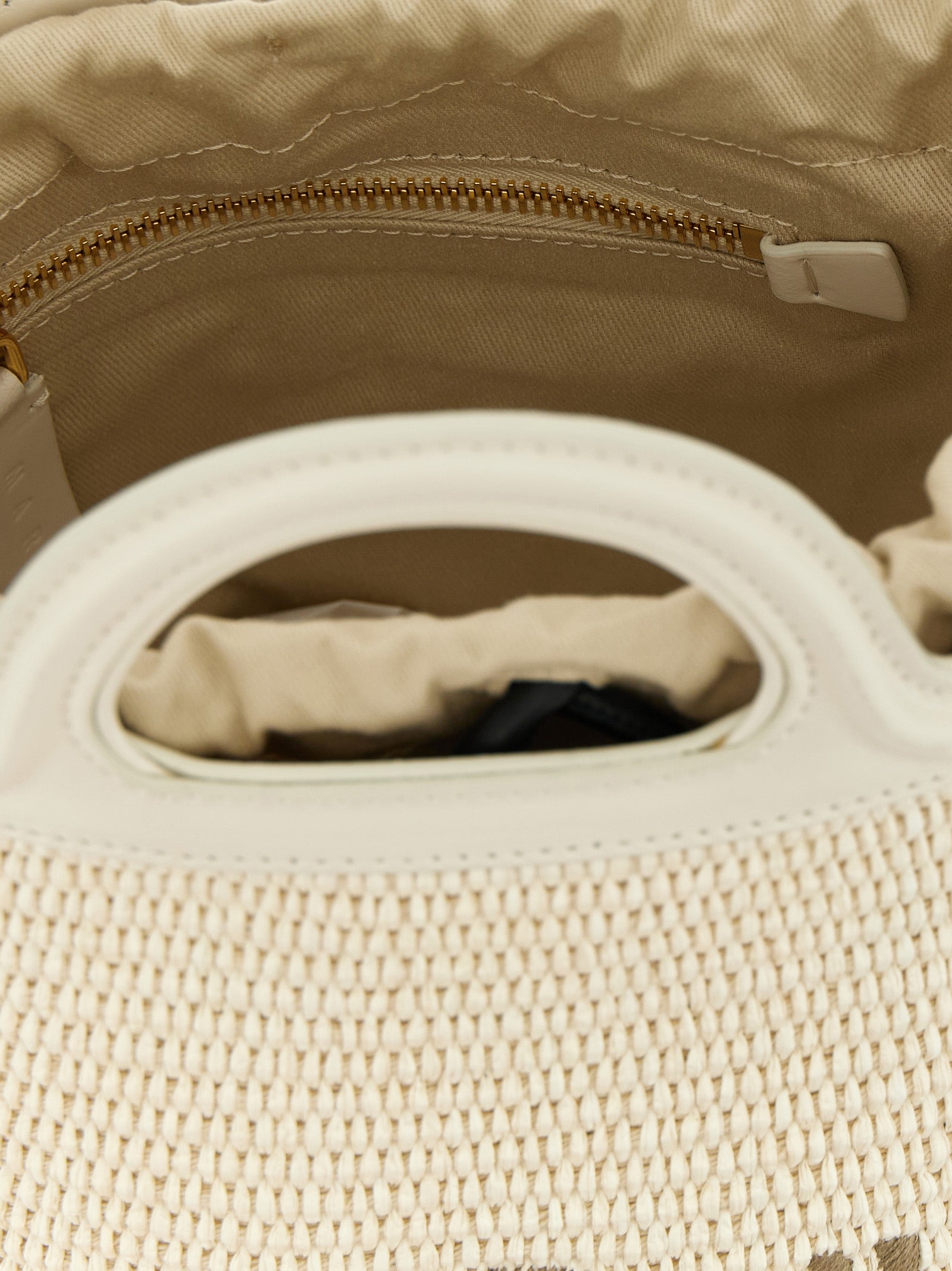 Small Bucket Handbag by Marni for women in cotton leather & polyester white features an refined silhouette, showcasing a secure drawstring, ample , and versatile shoulder-strap & adjustable-strap for a sophisticated refined aesthetic.