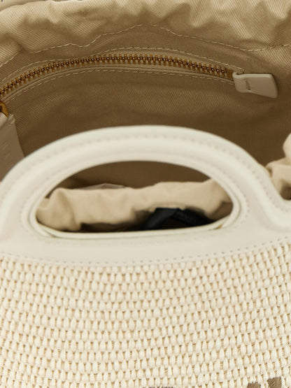 Small Bucket Handbag by Marni for women in cotton leather & polyester white features an refined silhouette, showcasing a secure drawstring, ample , and versatile shoulder-strap & adjustable-strap for a sophisticated refined aesthetic.
