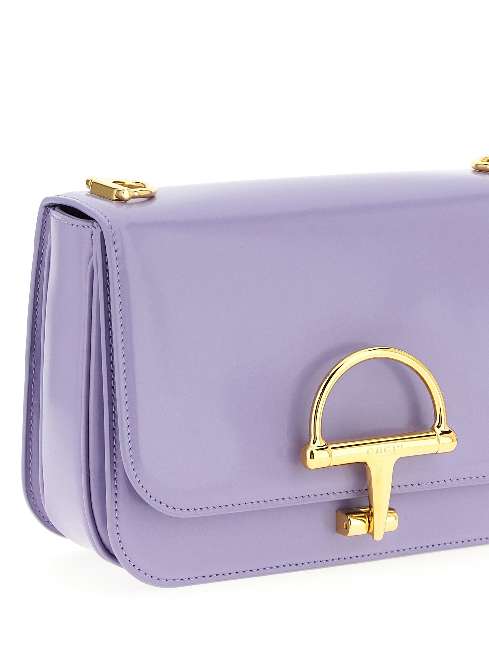 2-in-1 Shoulder & Crossbody Flap Bag by Gucci for women in calfskin leather purple presents a statuesque silhouette, showcasing a secure flap and statuesque with versatile crossbody-strap, shoulder-strap & adjustable-strap for a sophisticated look.