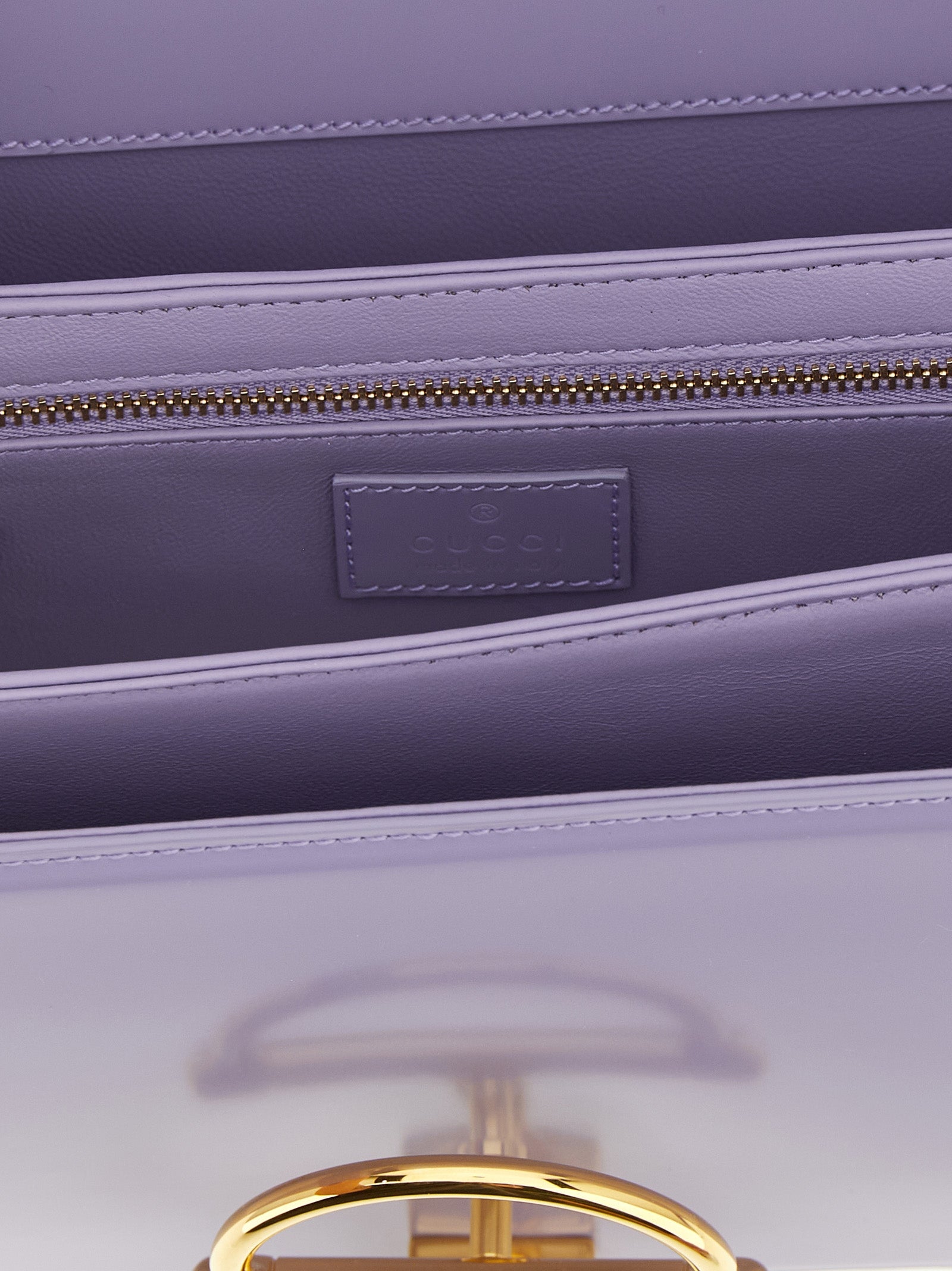 2-in-1 Shoulder & Crossbody Flap Bag by Gucci for women in calfskin leather purple showcases a statuesque silhouette, artfully detailed with a secure flap, organized , and versatile crossbody-strap, shoulder-strap & adjustable-strap for a statuesque look.