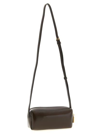 Mini East West Crossbody Handbag by Khaite for women in calfskin leather brown features a multifaceted silhouette, showcasing a secure zipper and multifaceted with versatile crossbody-strap, shoulder-strap & adjustable-strap for multifaceted style.