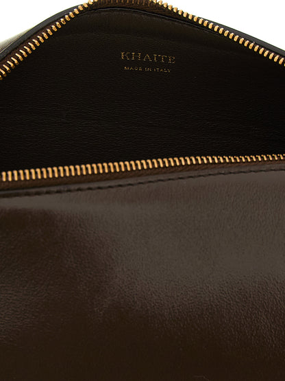 Mini East West Crossbody Handbag by Khaite for women in calfskin leather brown features a transformative sophistication silhouette, showcasing a secure zipper, ample , and versatile crossbody-strap, shoulder-strap & adjustable-strap for a transformative sophistication look.