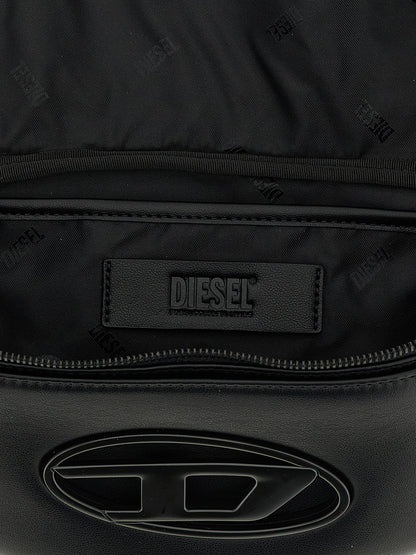 This Crossbody Messenger Bag by Diesel for men in polyethylene & polyurethane black presents a versatile silhouette from the Holi D Polyethylene & Polyurethane Crossbody Messenger Bag collection, featuring a secure , ample , and versatile crossbody-strap, shoulder-strap & adjustable-strap.