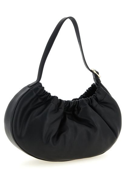 Shoulder Bag by A.P.C. for women in leather cotton polyethylene black & hooped features a stately silhouette, showcasing a secure magnetic, ample , and stately shoulder-strap, adjustable-strap & handle for a stately finish.