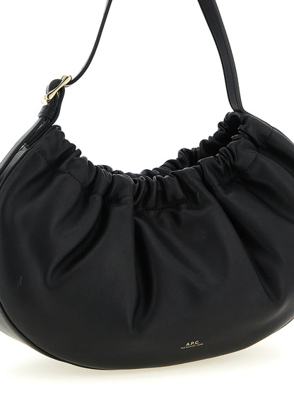 Shoulder Bag by A.P.C. for women in leather cotton polyethylene black & hooped features a effortless chic silhouette with a secure magnetic, ample , and versatile shoulder-strap, adjustable-strap & handle for a effortless chic finish.