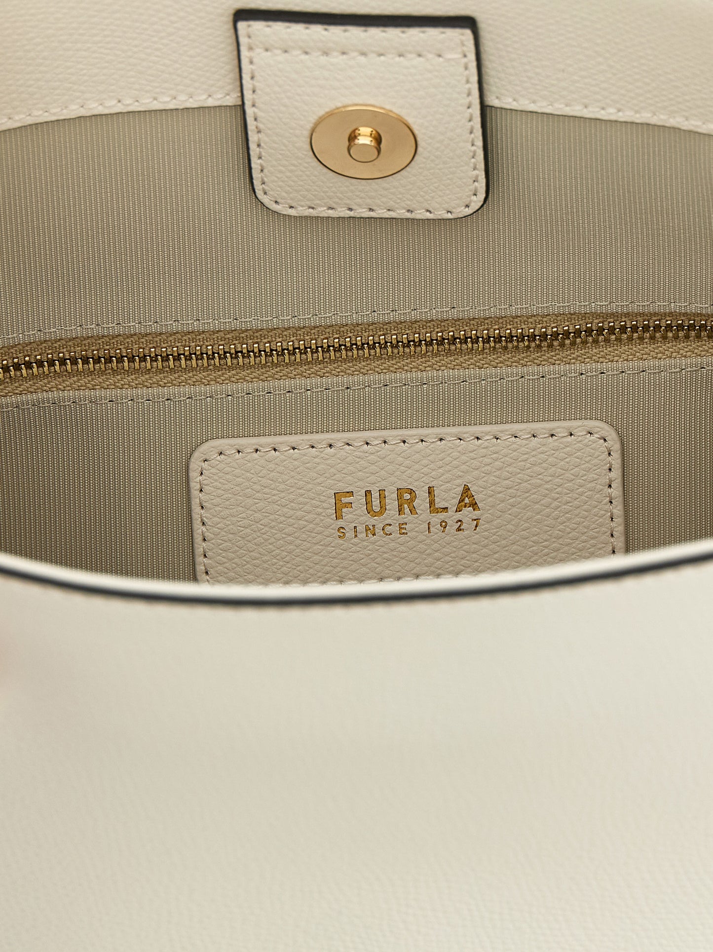 Small Shoulder Bucket Bag by Furla for women in calfskin leather white & print features a stately silhouette, showcasing a secure , ample , and stately shoulder-strap & adjustable-strap for a stately finish.